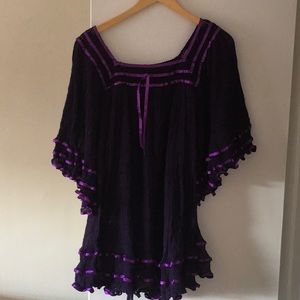 A beach coverup in purple, one size fits most!